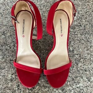 Red ankle strap heels by Body Central.